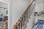 Stairs to the second, plenty of beach chairs and games for the whole family